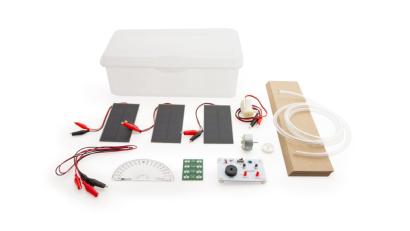 equipment for lab spread out on table including solar panels