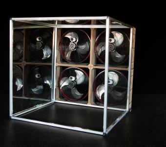 Enclosed box creating a tunnel with 4 box fans